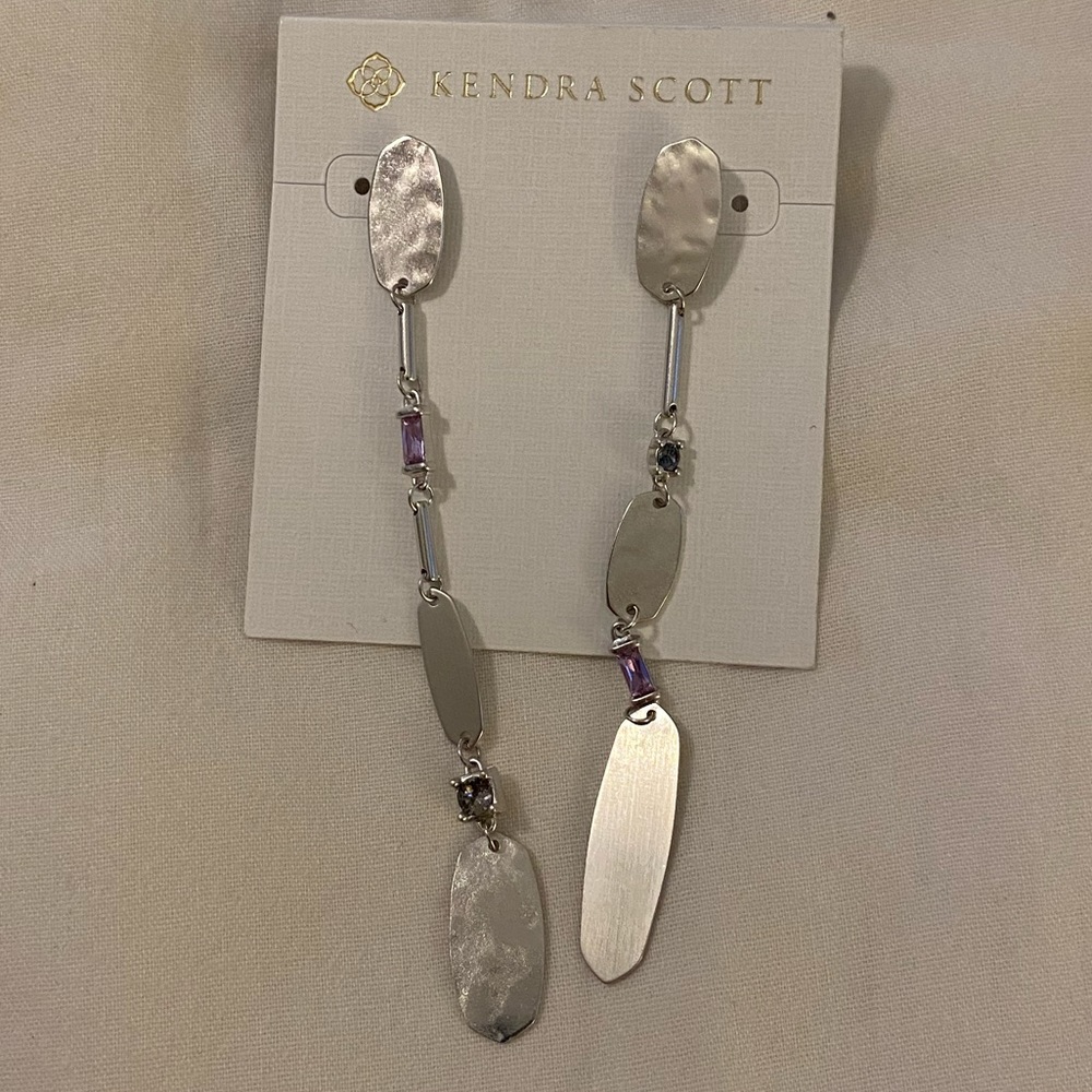 Kendra Scott silver earrings with purple and blue accents